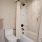 Luxury Seattle apartment bathroom with quartz counters and elegant lighting