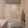 bathroom with yellow lighting