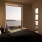 Bedroom with natural lighting and high ceilings