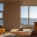 Elegant living area with skyline views and contemporary design at Kaye