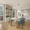 Luxury apartment kitchen with quartz countertops, stainless steel appliances, and custom cabinetry at Kaye Belltown