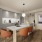 Contemporary kitchen featuring premium materials and designer lighting at Kaye