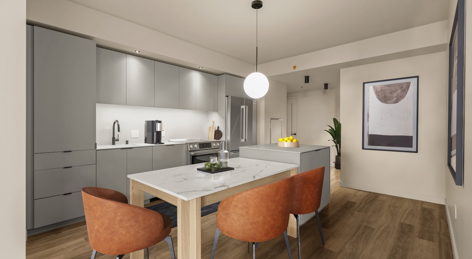 Contemporary kitchen featuring premium materials and designer lighting at Kaye